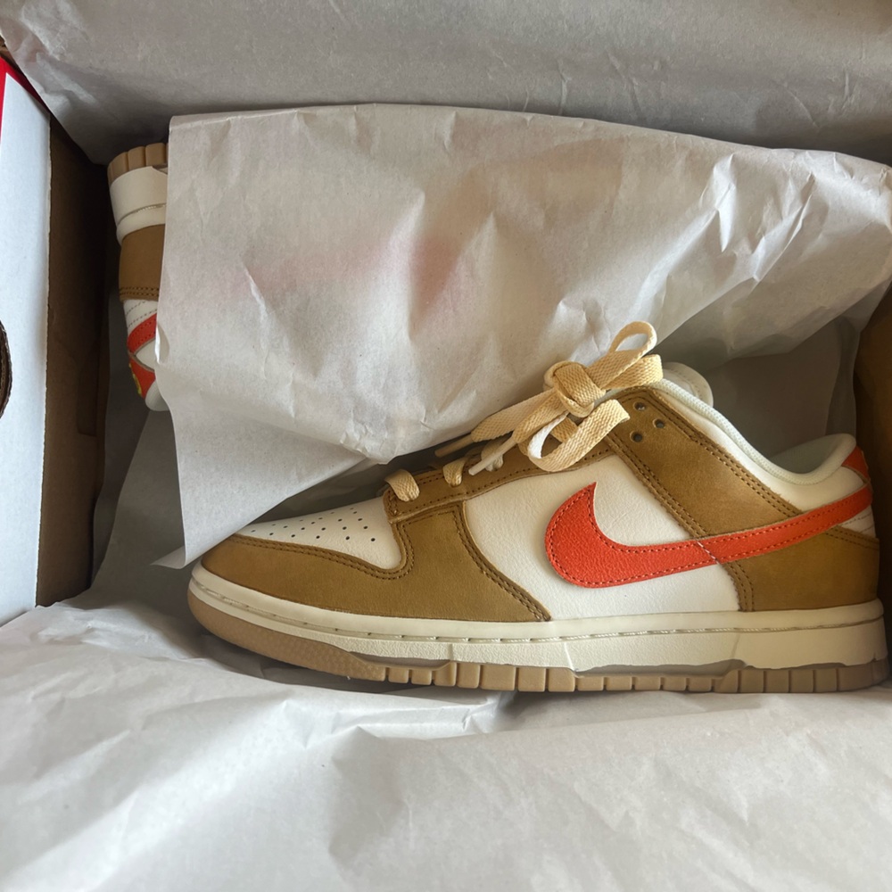 New, never worn, in box. Nike Dunks.
